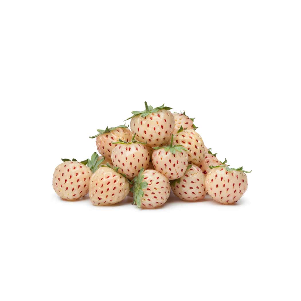 weiße Erdbeeren Ein Stapel Erdbeeren mit roten Punkten
